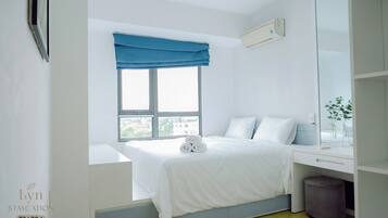 Deluxe-lejlighed - 2 soveværelser - balkon - byudsigt (3) | Premium-sengetøj, senge med madrasser af memory foam, individuelt design