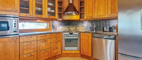 Fridge, microwave, dishwasher, cookware/dishes/utensils