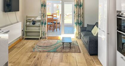 Very spacious property across the road from a lovely golden sanded beach.