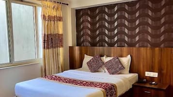 Habitación individual Deluxe | Escritorio y espacio para trabajar con un portátil