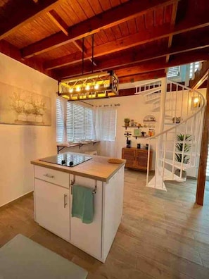 Fridge, microwave, stovetop, coffee/tea maker