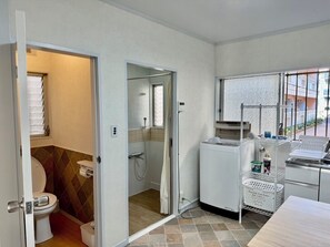 Shower, hair dryer, towels, soap