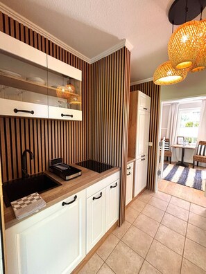 Fridge, microwave, stovetop, coffee/tea maker