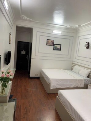 Family Room, City View | Blackout drapes, soundproofing, free WiFi