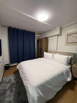 1 غرفة نوم ومكواة/لوح كي وواي فاي وملاءات أسرّة