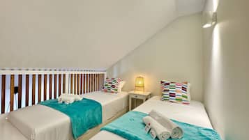 3 habitaciones y ropa de cama