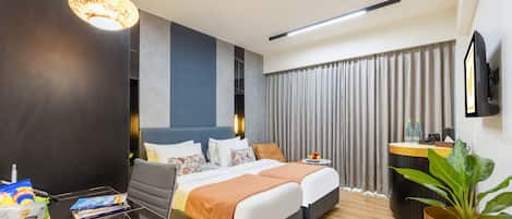 Premium bedding, minibar, in-room safe, laptop workspace