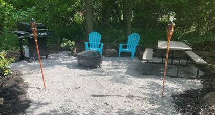 Rv and campsite on the Deer River. 50 amp, sewage dump. 15x60 pad