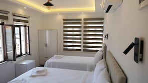 Standard Triple Room, Balcony, City View