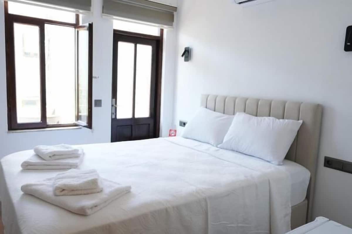 Economy Double Room, Balcony, City View | Iron/ironing board, free WiFi