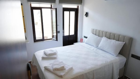 Economy Double Room, Balcony, City View | Iron/ironing board, free WiFi