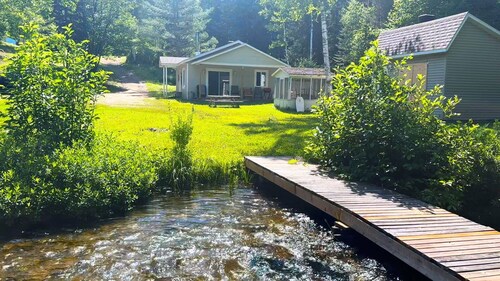 Cosy cottage in the heart of nature with stream, footbridge and private island