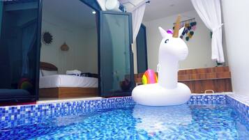 Family Room, Lanai, Pool View | Desk, laptop workspace, free WiFi