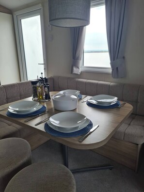 Apartment, 3 Bedrooms, Terrace, Garden View | Dining room - The Seaflower - With Lake Views (Millom)