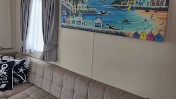 Appartement, 3 chambres, terrasse, vue jardin | Salle de séjour | Livres