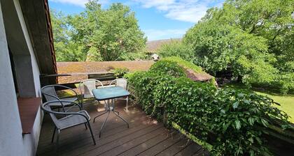 Cozy vacation apartment in the middle of nature, with terrace and barbecue area