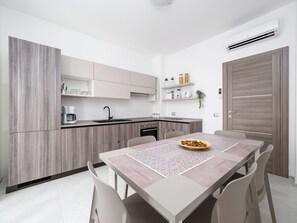 Comfort Apartment, Balcony, City View | Private kitchen | Full-size fridge, microwave, stovetop, espresso maker