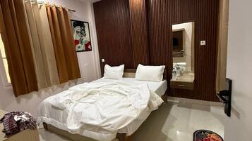 غرفة ديلوكس | حمام | تجهيزات دش، مستلزمات مجانية للعناية الشخصية، مناشف، صابون