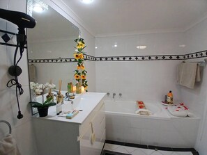 Hair dryer, towels, soap, toilet paper