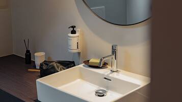 Deluxe Double Room, Garden View | Bathroom | Shower, hair dryer, towels, soap