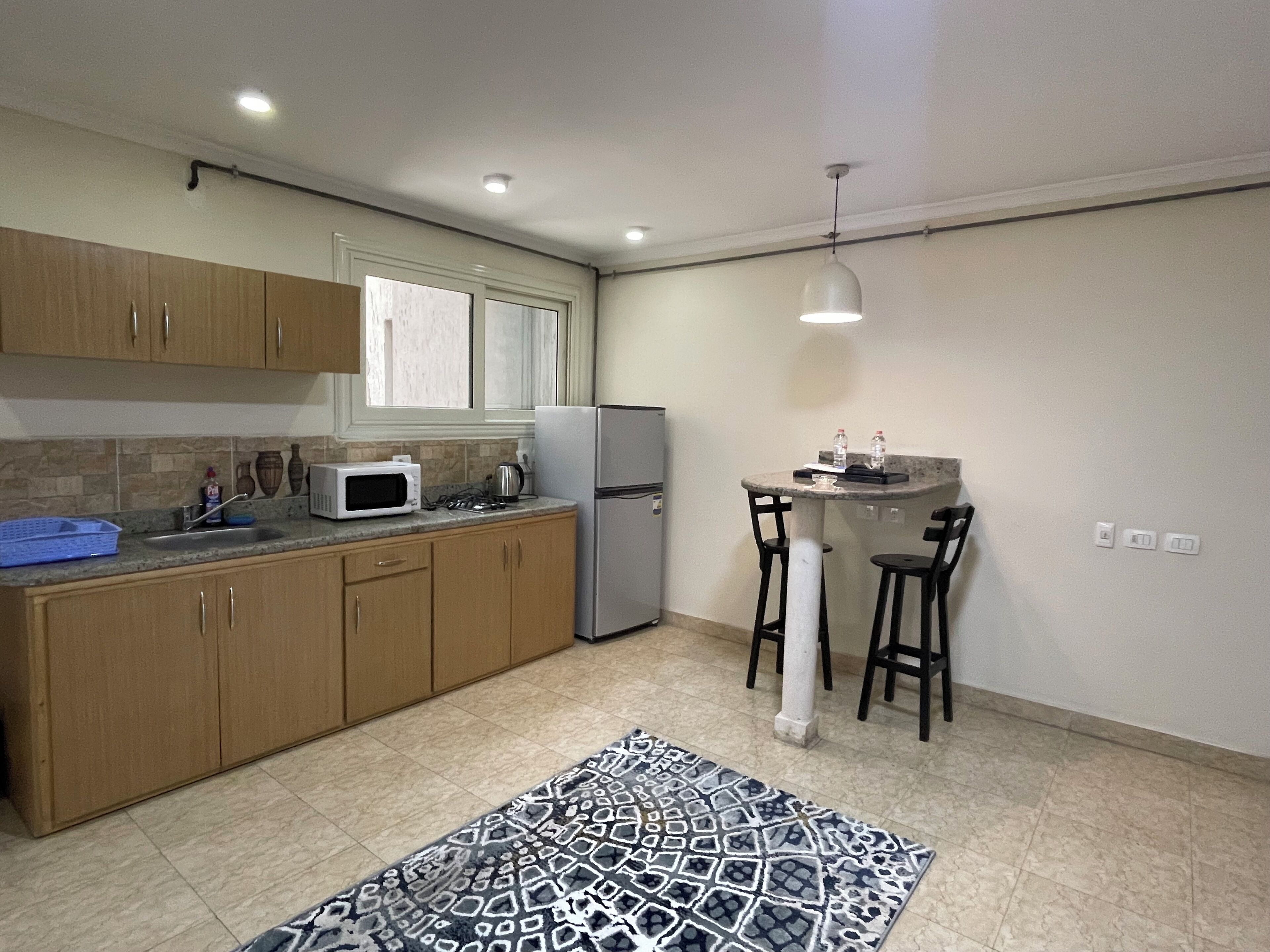 Deluxe Apartment, City View | Private kitchen