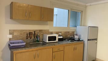 Standard Single Room, City View | Private kitchen