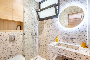 Shower, hair dryer, towels, soap