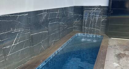 Excellent house with swimming pool and two bedrooms, close to the airport and bus station