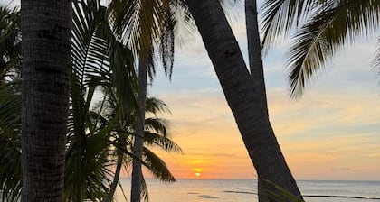 Hello Sunshine! Beachfront 2BR 2BA condo Retreat Rum Point w/ GYM, Tennis, &WiFi