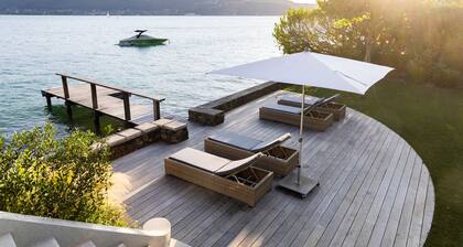 Beautiful lakeside home with a private pontoon. Perfect place to unwind.