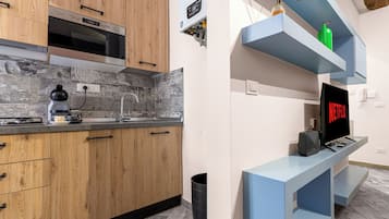 Condo, 2 habitaciones, aire acondicionado | Cocina privada | Cafetera de espresso, cafetera y tetera, tetera eléctrica y periquera