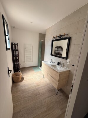 Shower, hair dryer, towels, soap