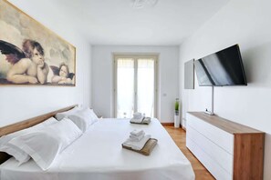 2 habitaciones, tabla de planchar con plancha, cuna de viaje y wifi 