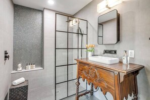 Shower, hair dryer, towels, soap