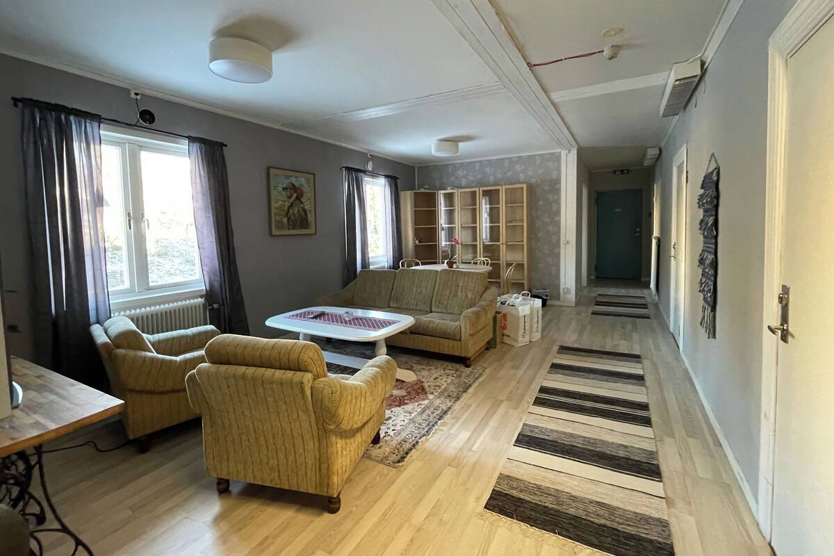 Habitación clásica con 1 cama doble o 2 individuales, vistas a la montaña | Zona de estar