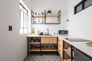 Fridge, microwave, coffee/tea maker, toaster