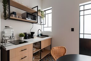 Fridge, microwave, coffee/tea maker, toaster