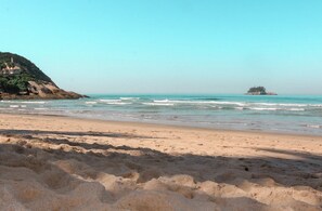 On the beach, white sand, free beach cabanas, sun loungers
