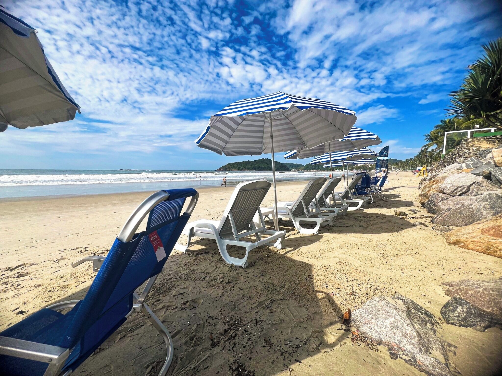 On the beach, white sand, free beach cabanas, sun loungers