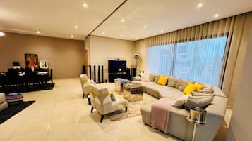 Smart TV, books, music library, stereo