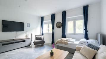Appartamento Comfort | Area soggiorno | Pavimenti riscaldati, studio