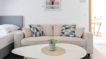 Superior-lejlighed - flere senge - køleskab og mikrobølgeovn | Opholdsområde | Gulvvarme, kontorer