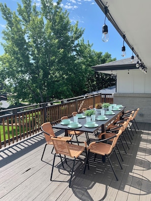 Upper Deck: 12 person dining table, fire pit, BBQ, market lights