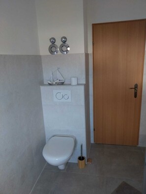 Hair dryer, towels, soap, toilet paper