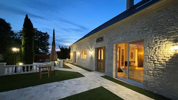 A stone building with a sign reading "Oceba" at the entrance. - Comfortable country house with heated swimming pool in Eure et Loire (Tillay-le-Péneux)