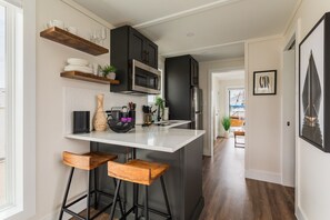 Fridge, microwave, dishwasher, coffee/tea maker