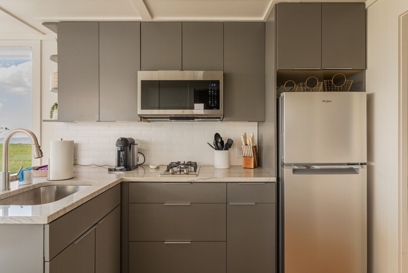 Fridge, microwave, stovetop, coffee/tea maker