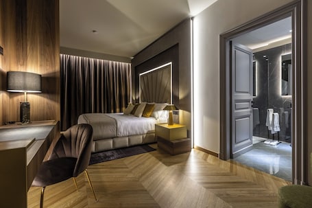 Junior Studio Suite, City View | Minibar, in-room safe, desk, laptop workspace