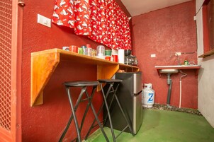 Mini-fridge, microwave, cookware/dishes/utensils