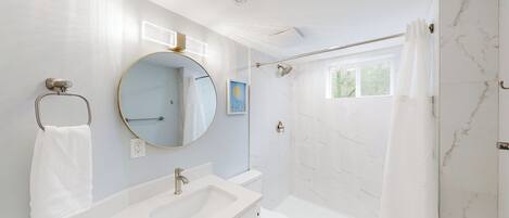 Shower, hair dryer, towels, soap